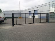 Large Metal Mesh Gates at Factory in Manchester